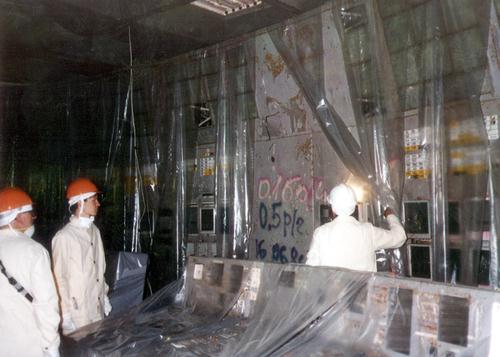 Inside sarcophagus, Chornobyl NPP Unit 4 control room,
	    as seen during tour. Photographer: Dennis Kreid 1996 May
	    [US DOE]